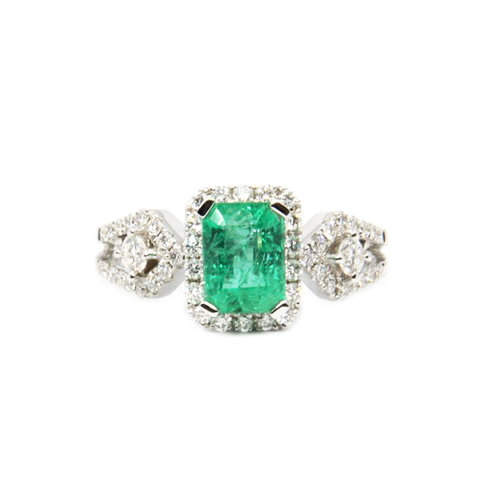 Vintage Emerald & Diamond Halo Ring in White Gold
